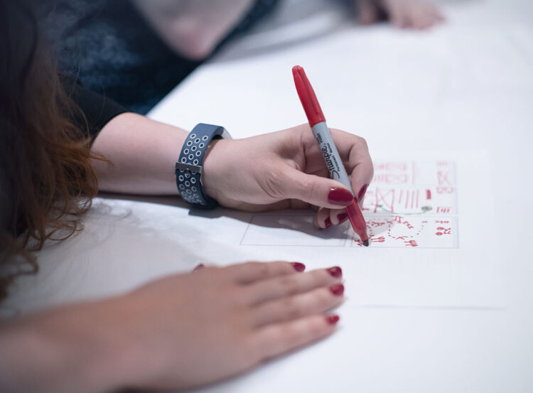 UX designer sketching a wireframe